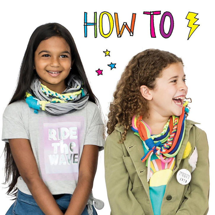 Tween girls wearing handmade t-shirt yarn scarves