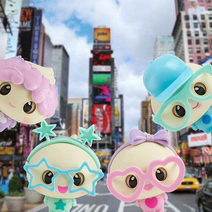 My Squishy Little Dumplings Doe, Dip, Dee, and Dot standing in Times Square