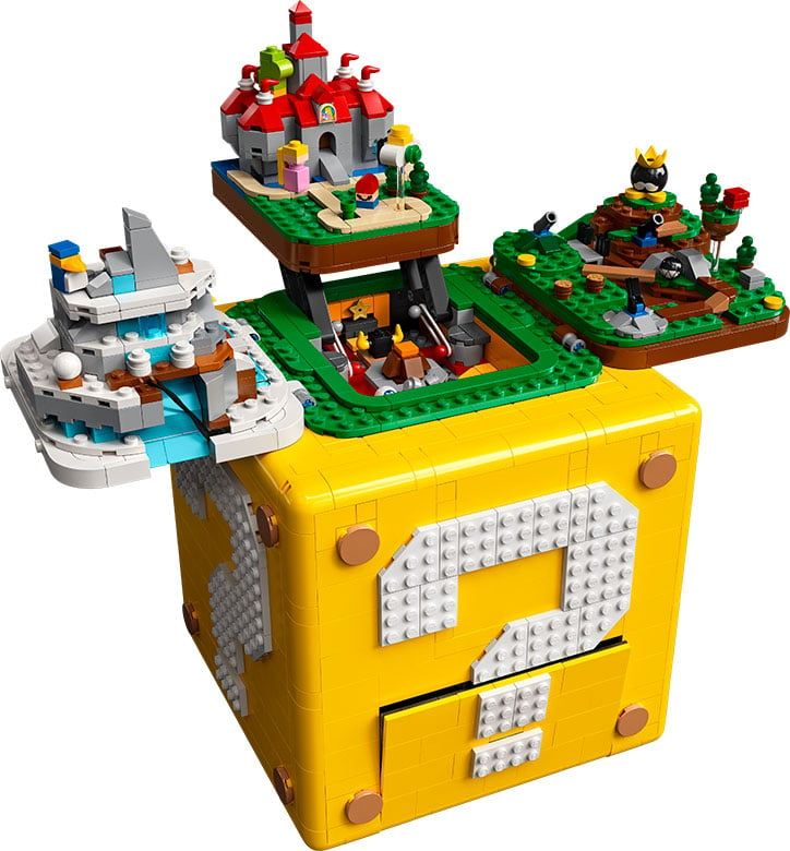 Product image for the LEGO Super Mario ? Block Set, opened up to show off the three Mario 64 inspired level builds