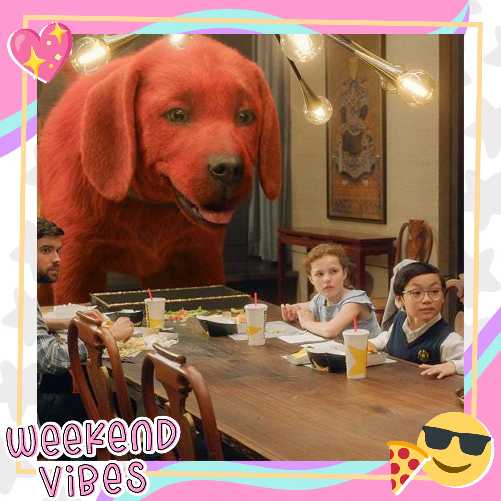 Photo still from Clifford the Big Red Dog where Clifford is standing at the head of the table