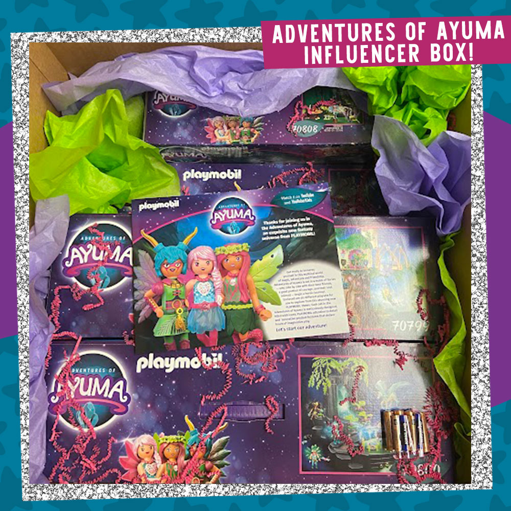 Photo featuring the inside of the Playmobil Adventures of Ayuma Influencer Box. This box contains 6 Adventures of Ayuma Playmobil building kits, and this box was provided by the brand exclusively for influencers, toy unboxers, and for giveaway purposes.