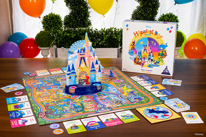 Product photo of the Disney Happiest Day game showcasing the box, board, pieces, and other game elements