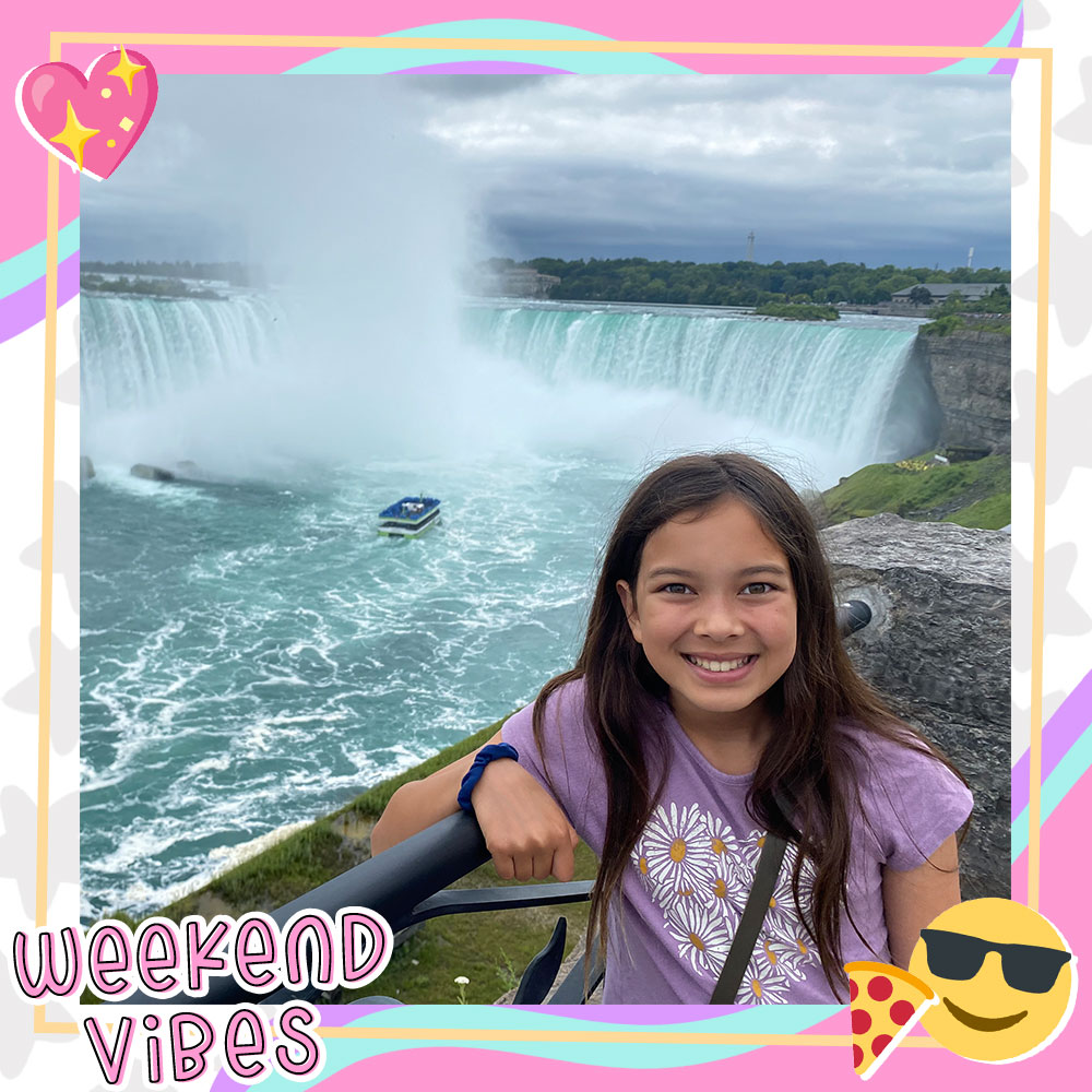 Joselyn Picard smiling in front of a waterfall