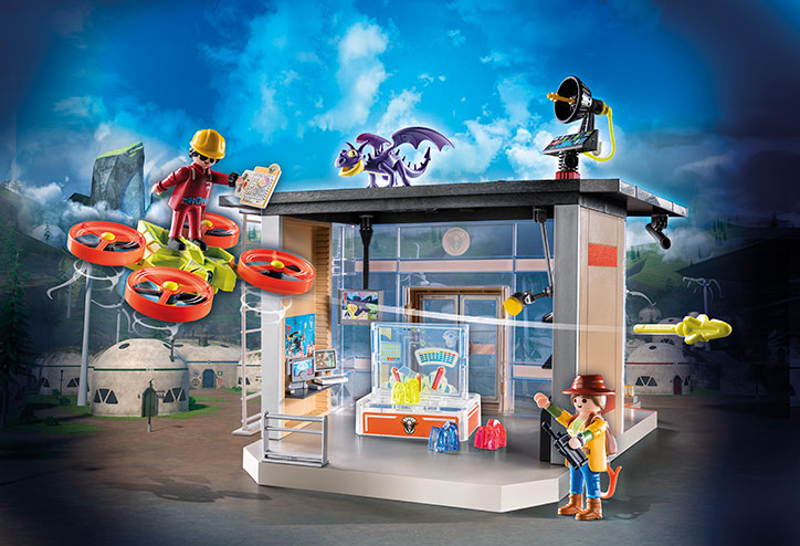 Completed PLAYMOBIL Dragons: The Nine Realms Icaris Labs set over a backdrop from the tv series