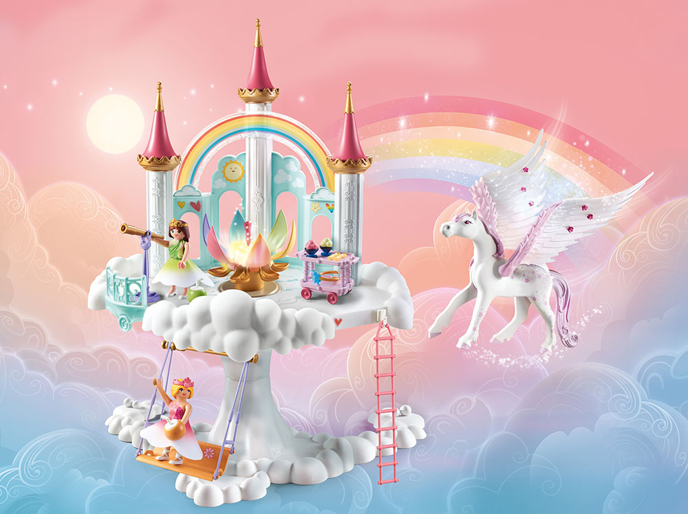 Fully assembled PLAYMOBIL Rainbow Castle in the Clouds set laid over sunset backdrop with a rainbow