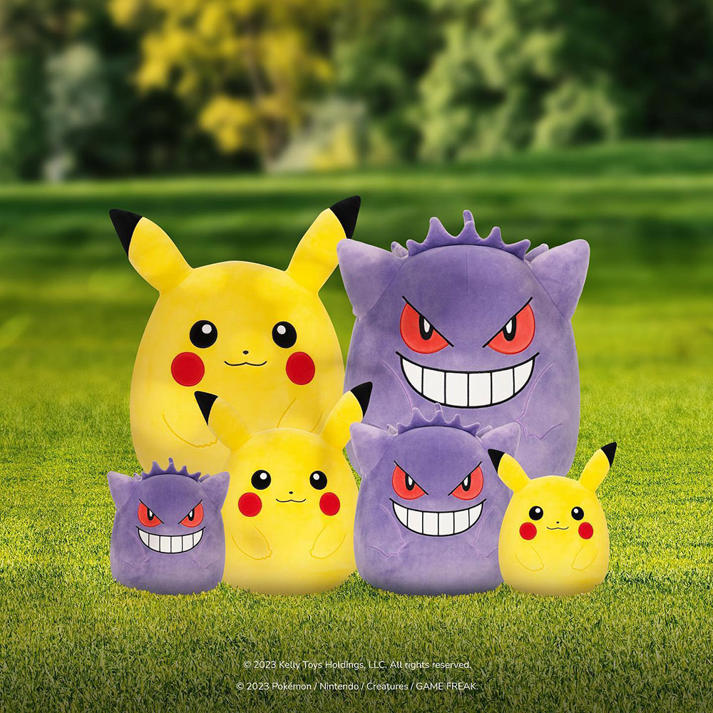 Pikachu and Gengar Squishmallows sitting in a field.