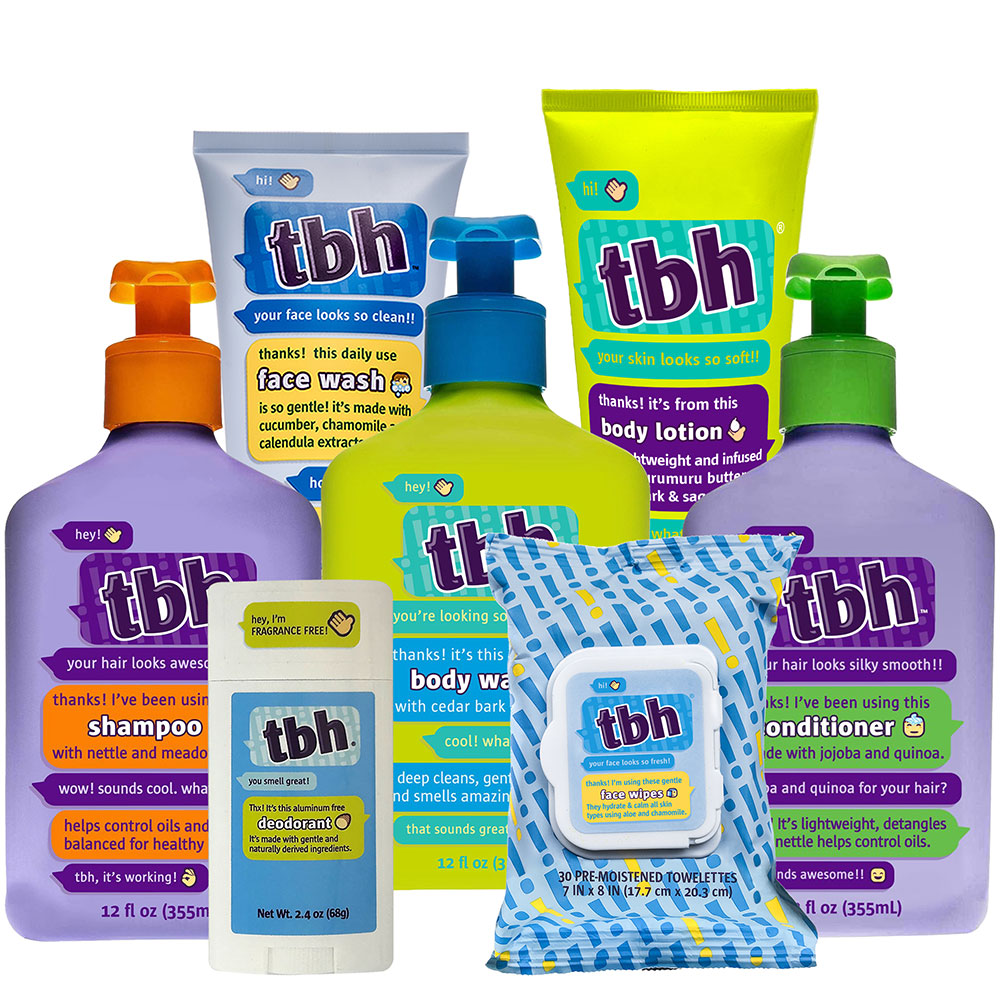 All of the items in the TBH Kids Skincare Starter Kit laid out, including shampoo, conditioner, deodorant, face wash, and more