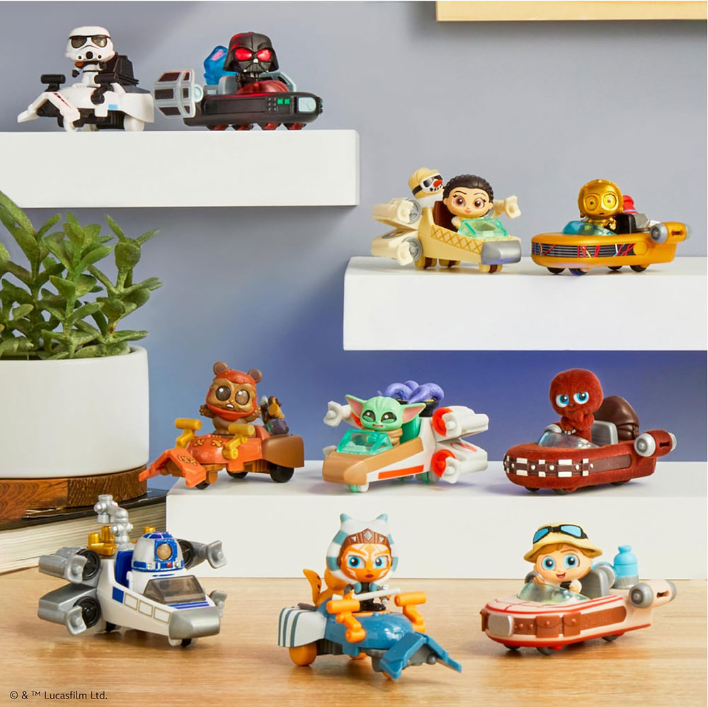 All 10 possible Star Wars Doorables characters & vehicles from the Galactic Cruisers line displayed on shelves.